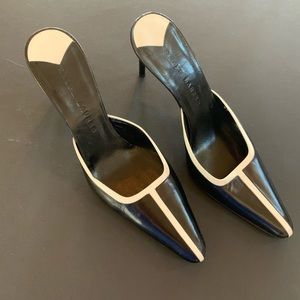 Black and white leather Ralph Lauren mules.